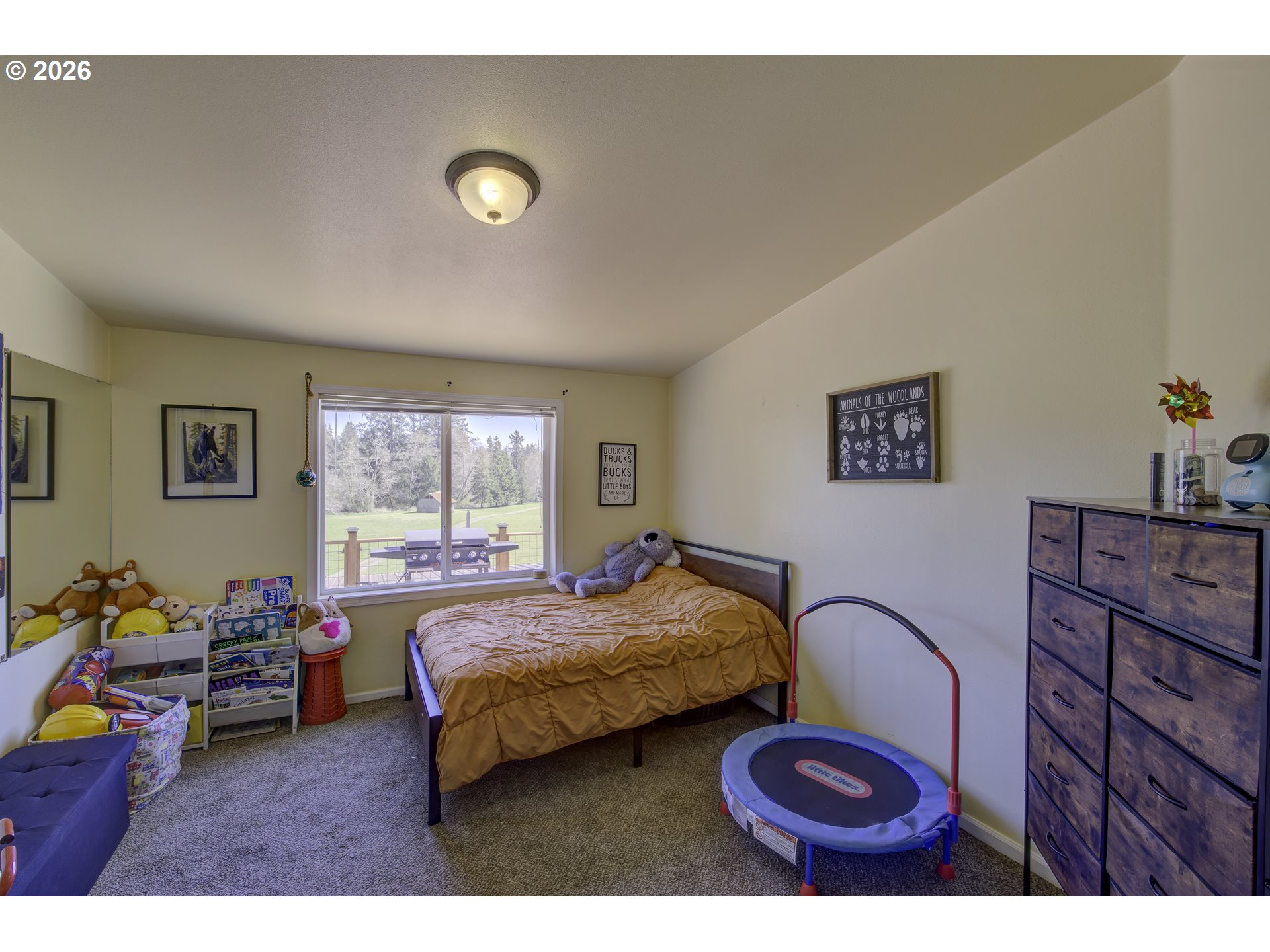 47 North Nemah Road East South Bend, WA 98586 - Photo 4 of 33 a bedroom with a bed and a window
