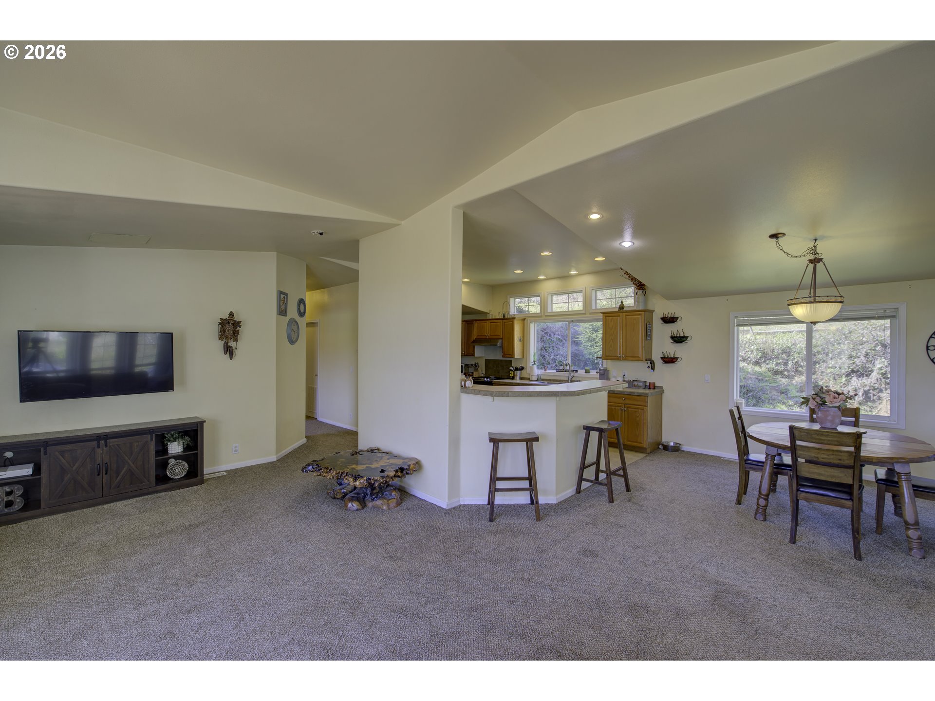 47 North Nemah Road East South Bend, WA 98586 - Photo 6 of 33 a living room with furniture and a flat screen tv