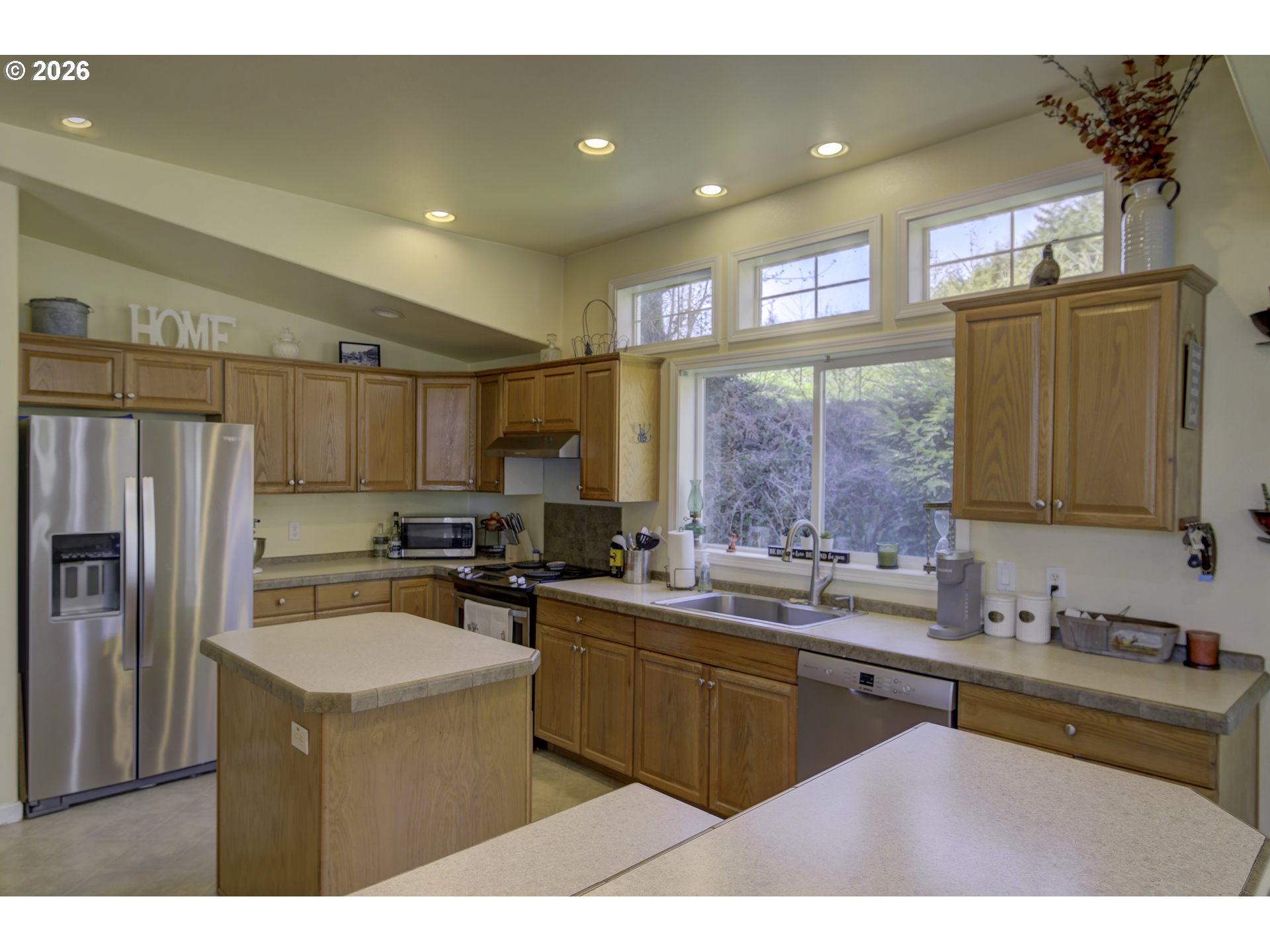47 North Nemah Road East South Bend, WA 98586 - Photo 7 of 33 a kitchen with a sink stove and refrigerator