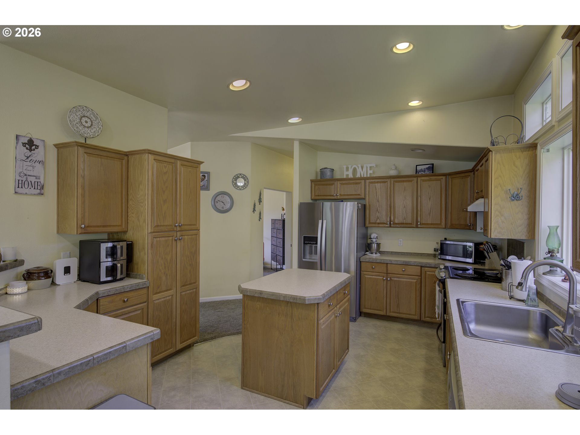 47 North Nemah Road East South Bend, WA 98586 - Photo 8 of 33 a kitchen with refrigerator and stove