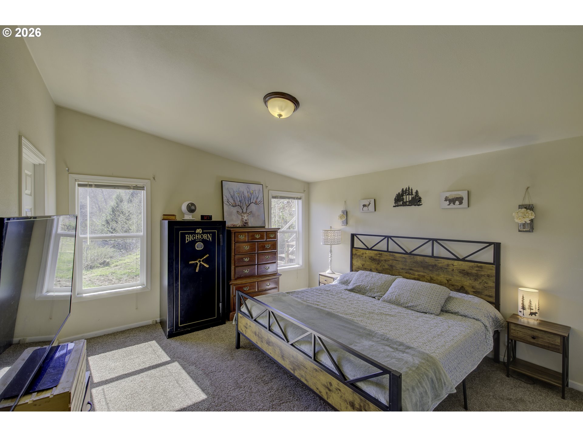 47 North Nemah Road East South Bend, WA 98586 - Photo 9 of 33 a bedroom with a bed and a large window