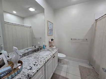 a bathroom with a shower and a tub