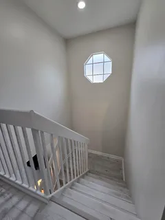 a view of a storage area with shoes and chairs