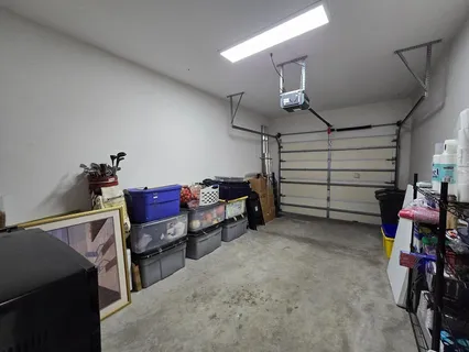 a view of a park with swings and slides