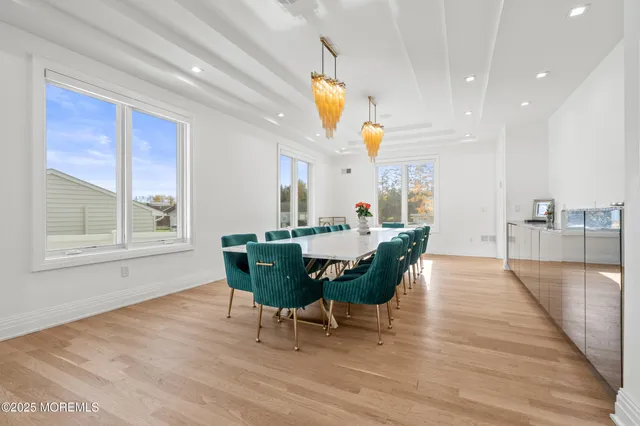 a kitchen with stainless steel appliances granite countertop a sink and cabinets