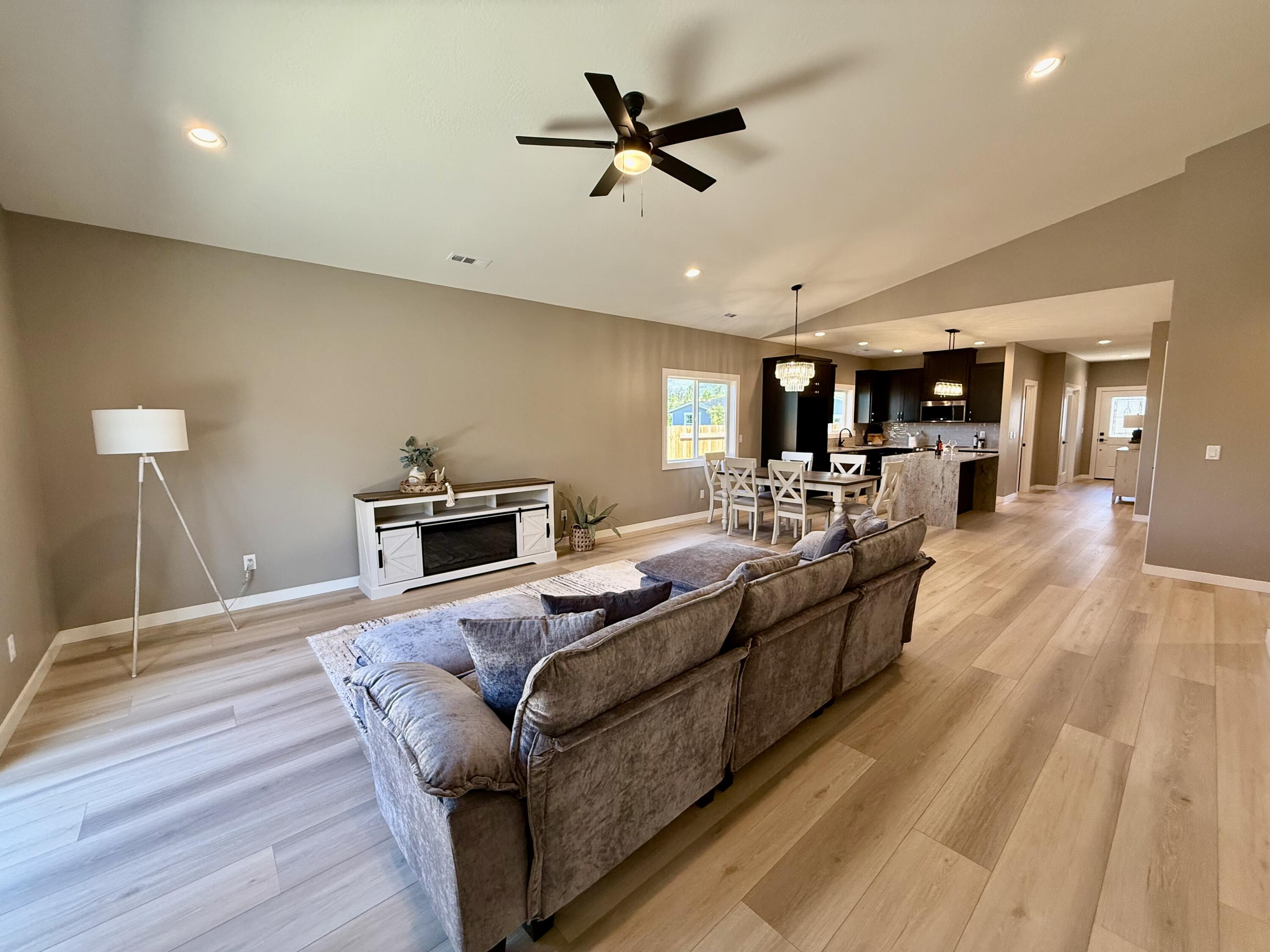 337 Quail Circle Talent, OR 97540 - Photo 11 of 25 a living room with furniture and a wooden floor