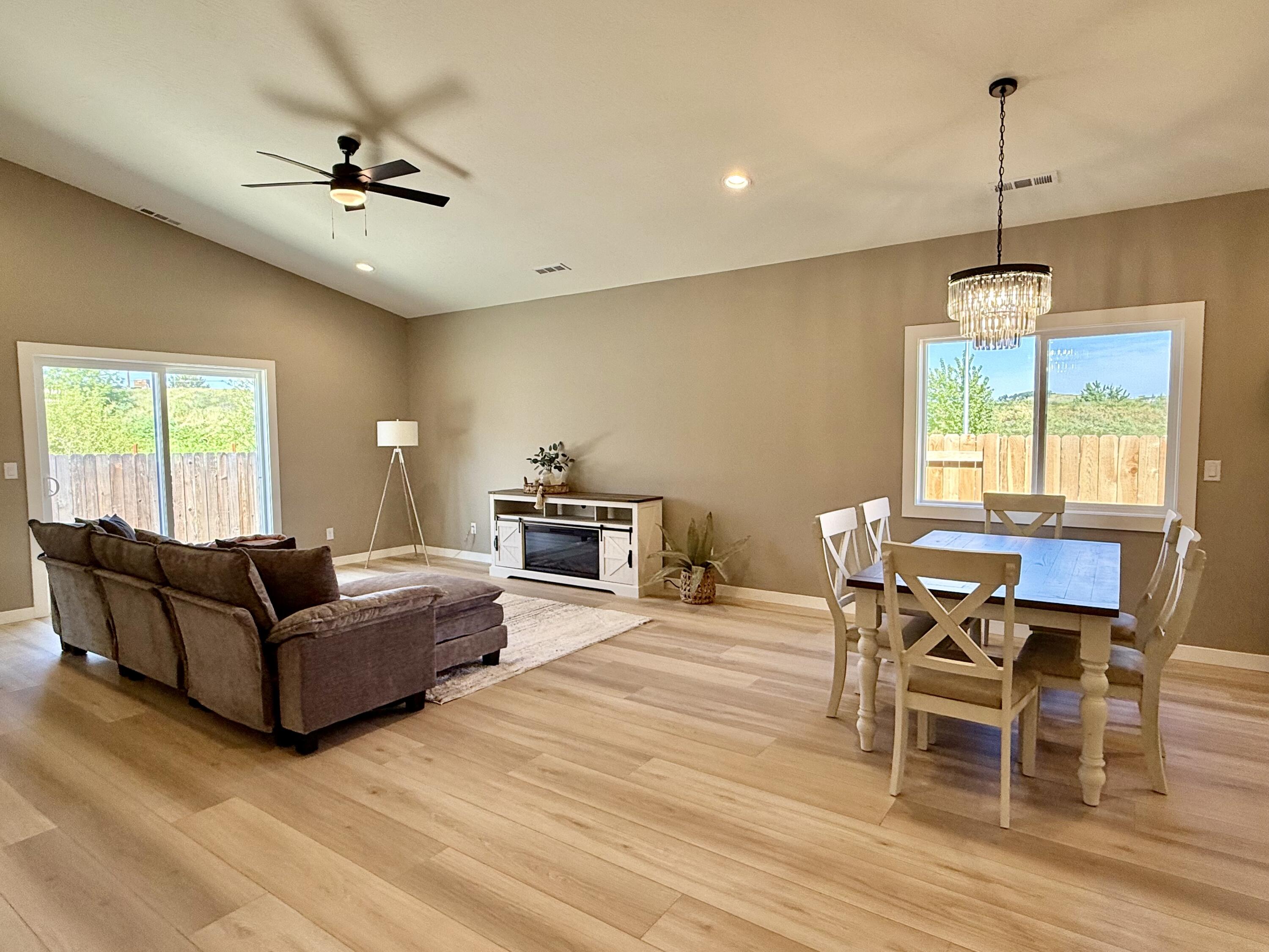 337 Quail Circle Talent, OR 97540 - Photo 10 of 25 a living room with furniture and a wooden floor