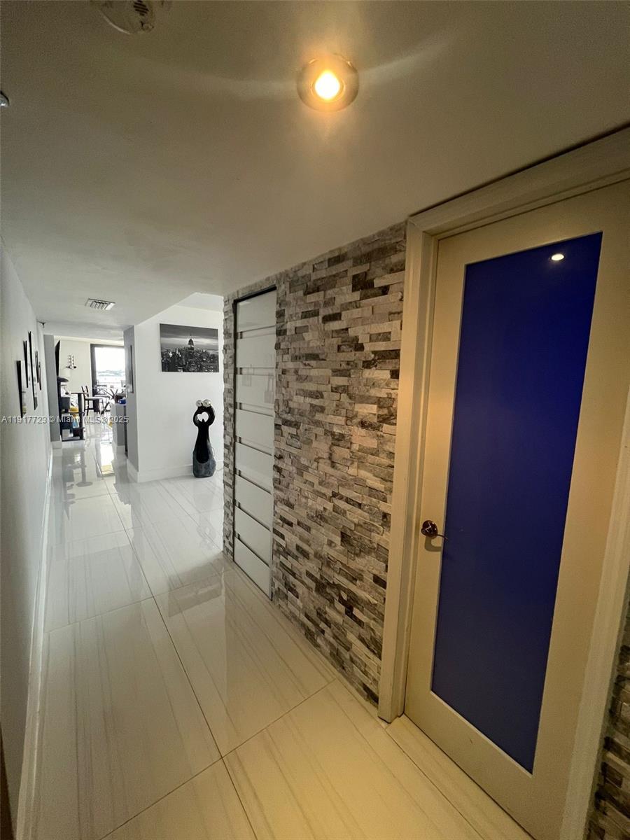 17878 North Bay Road, Unit 507 Sunny Isles Beach, FL 33160 - Photo 12 of 47 a view of gallery with wooden floor