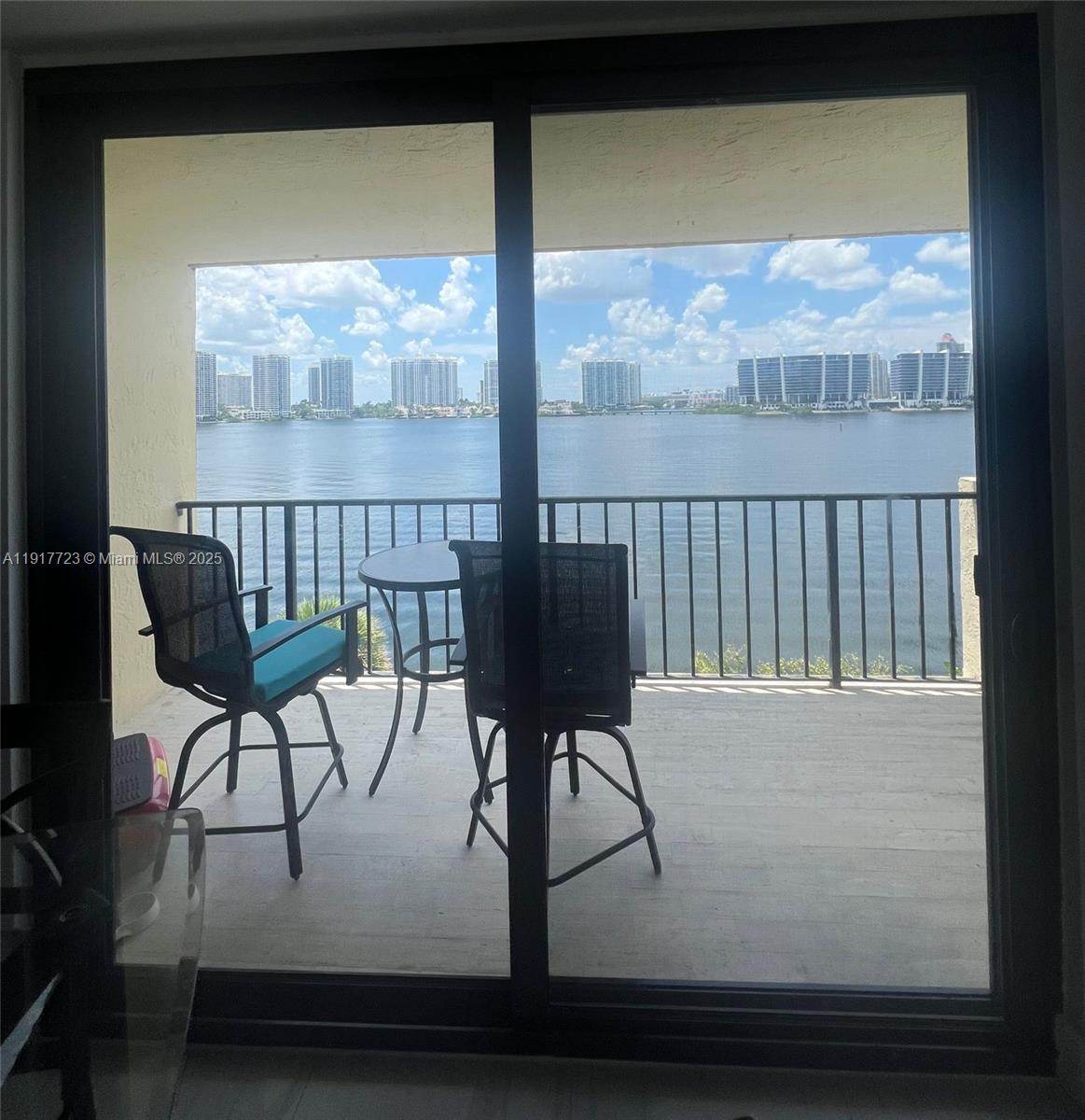 17878 North Bay Road, Unit 507 Sunny Isles Beach, FL 33160 - Photo 15 of 47 a view of a chairs and table in a balcony