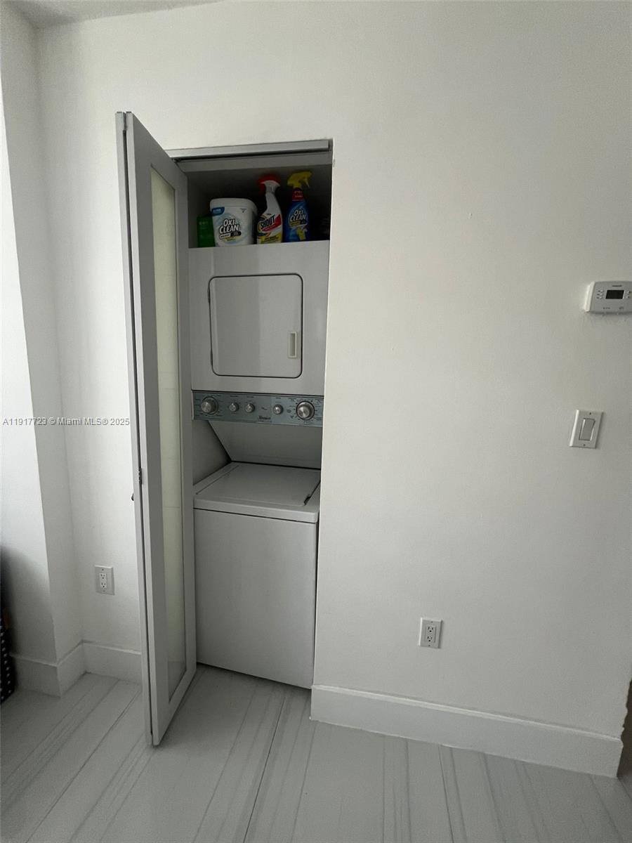 17878 North Bay Road, Unit 507 Sunny Isles Beach, FL 33160 - Photo 33 of 47 a utility room with dryer and washer