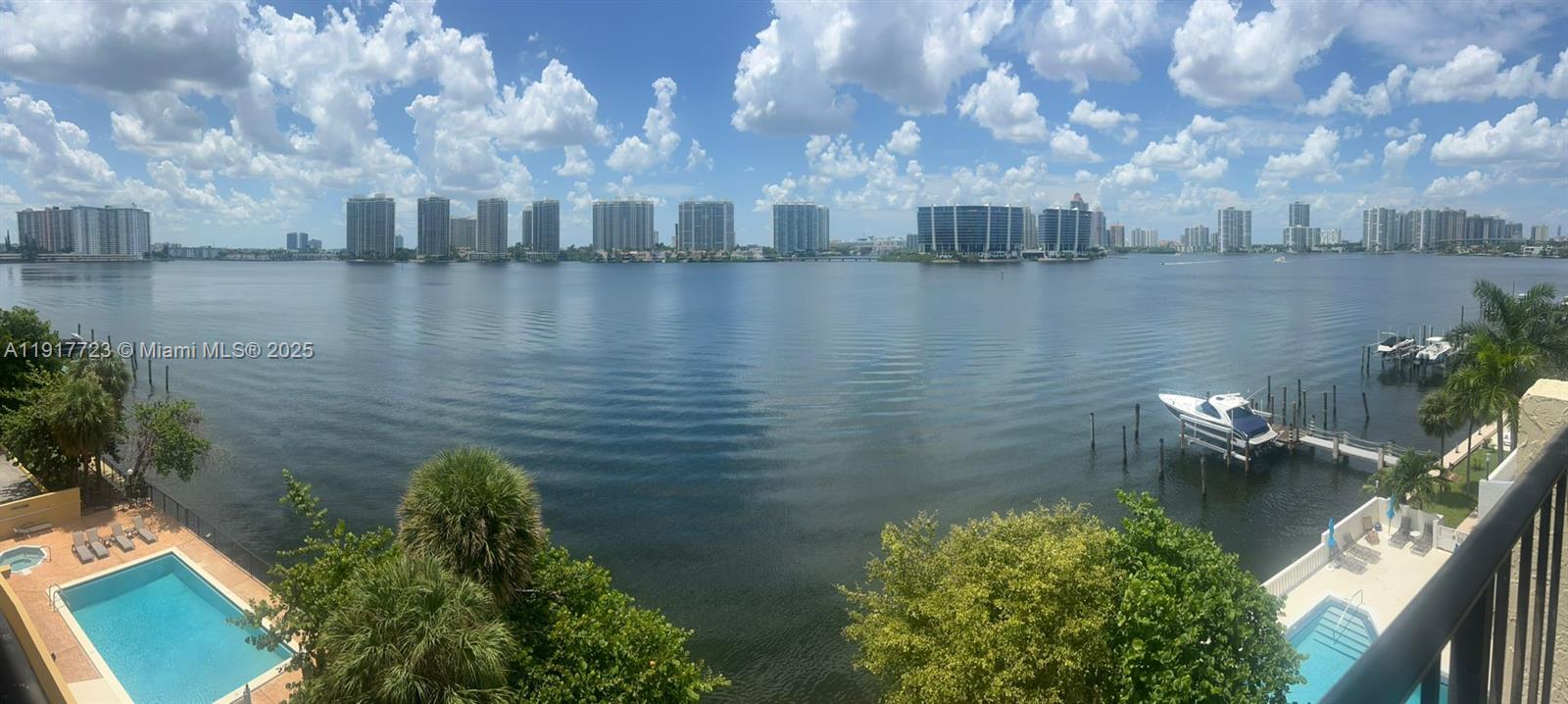 17878 North Bay Road, Unit 507 Sunny Isles Beach, FL 33160 - Photo 47 of 47 a view of a lake from a yard