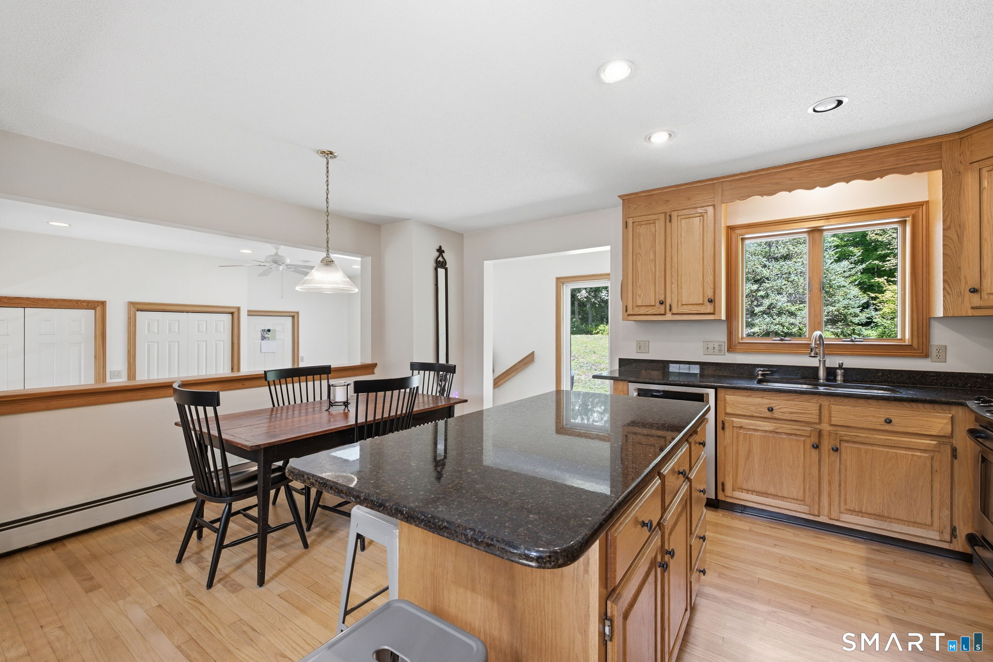 24 Liska Road Willington, CT 06279 - Photo 9 of 40 The kitchen is also open to the sunroom so the natural light flows into all rooms all day long!
