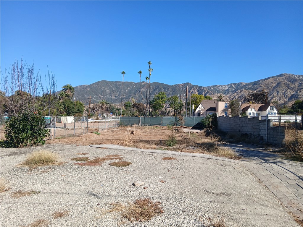 321 West Terrace Street Altadena, CA 91001 - Photo 3 of 11 a view of a dry yard with wooden fence
