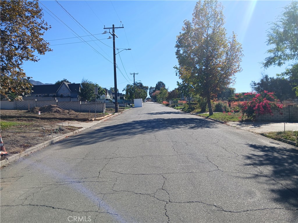 321 West Terrace Street Altadena, CA 91001 - Photo 9 of 11 a view of a road with a house in the background
