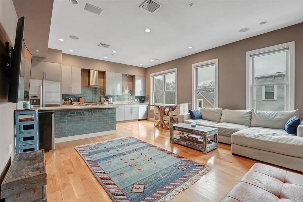 a living room with furniture and a table