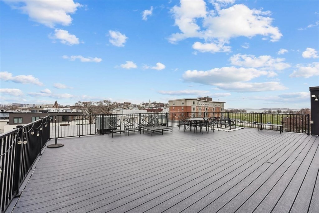 45 Vinton Street, Unit 4 Boston, MA 02127 - Photo 25 of 28 a view of a terrace with sitting area