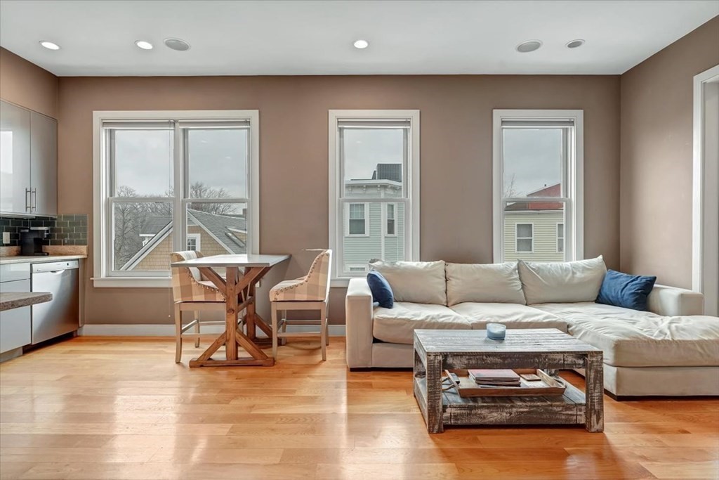 45 Vinton Street, Unit 4 Boston, MA 02127 - Photo 3 of 28 a living room with furniture and a large window