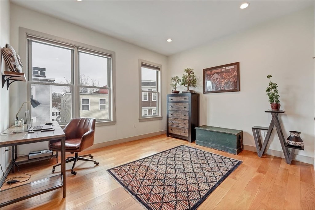 45 Vinton Street, Unit 4 Boston, MA 02127 - Photo 8 of 28 a living room with furniture rug and window