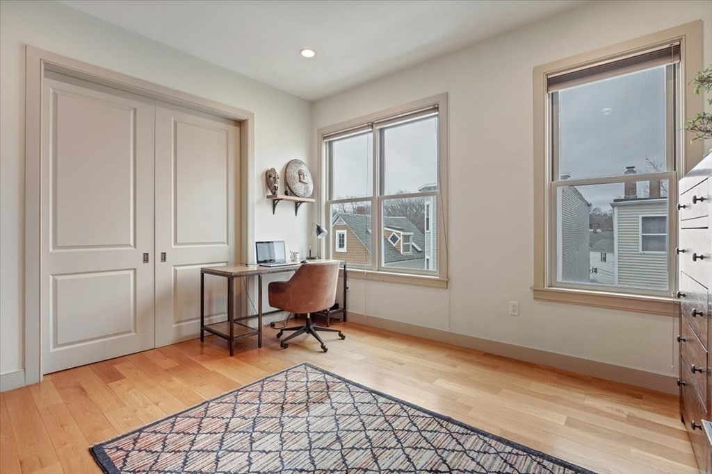 45 Vinton Street, Unit 4 Boston, MA 02127 - Photo 9 of 28 a workspace with furniture and a window