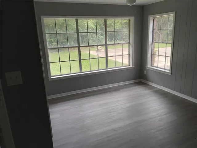 a kitchen with cabinets and stainless steel appliances