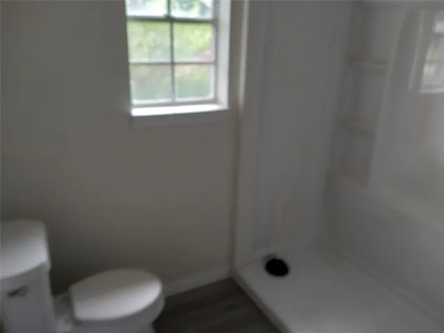 a bathroom with a toilet
