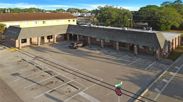 a view of a terrace with wooden floor and a city view