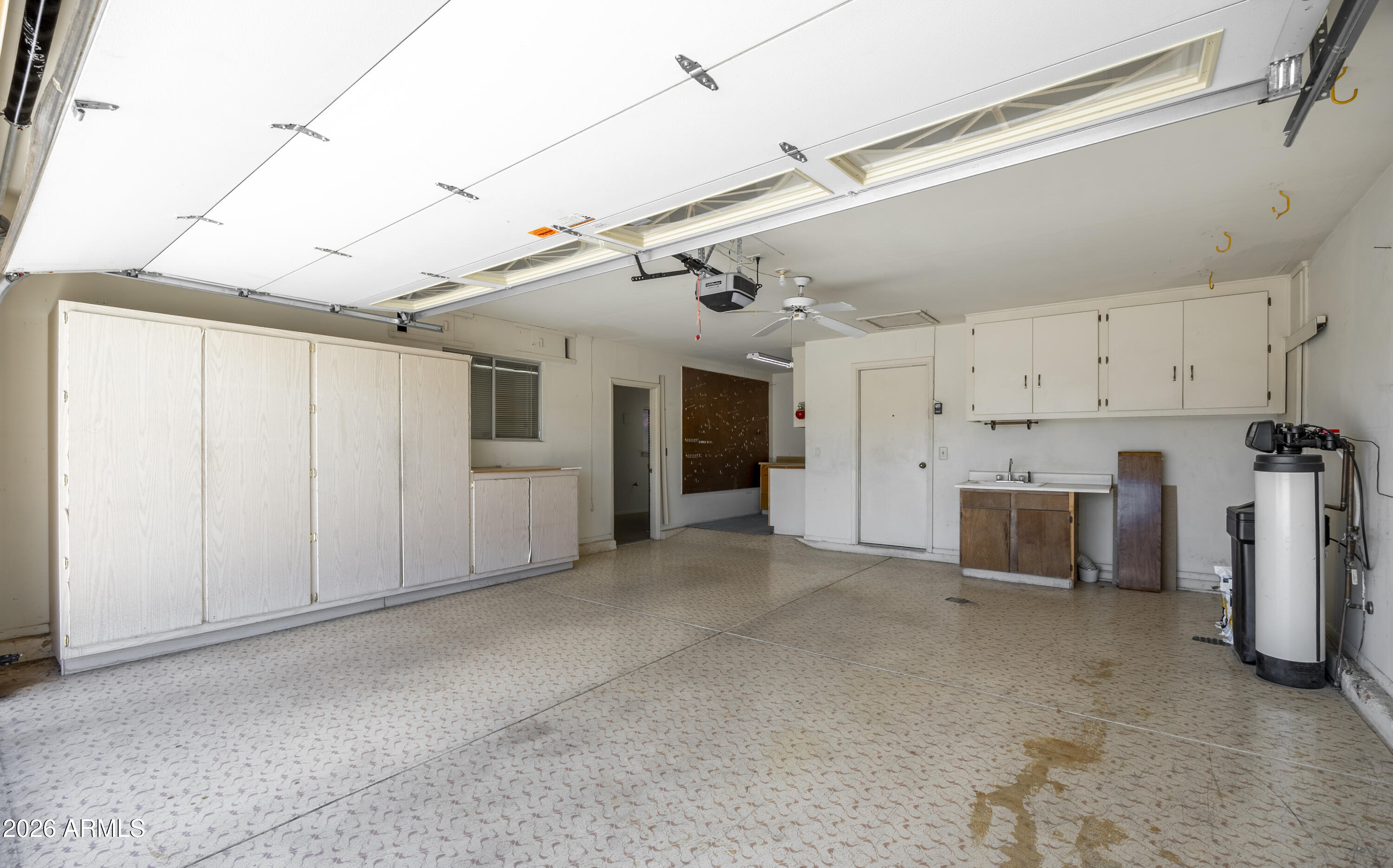 10415 West Ridgeview Road Sun City, AZ 85351 - Photo 22 of 30 Garage w/ cabinets