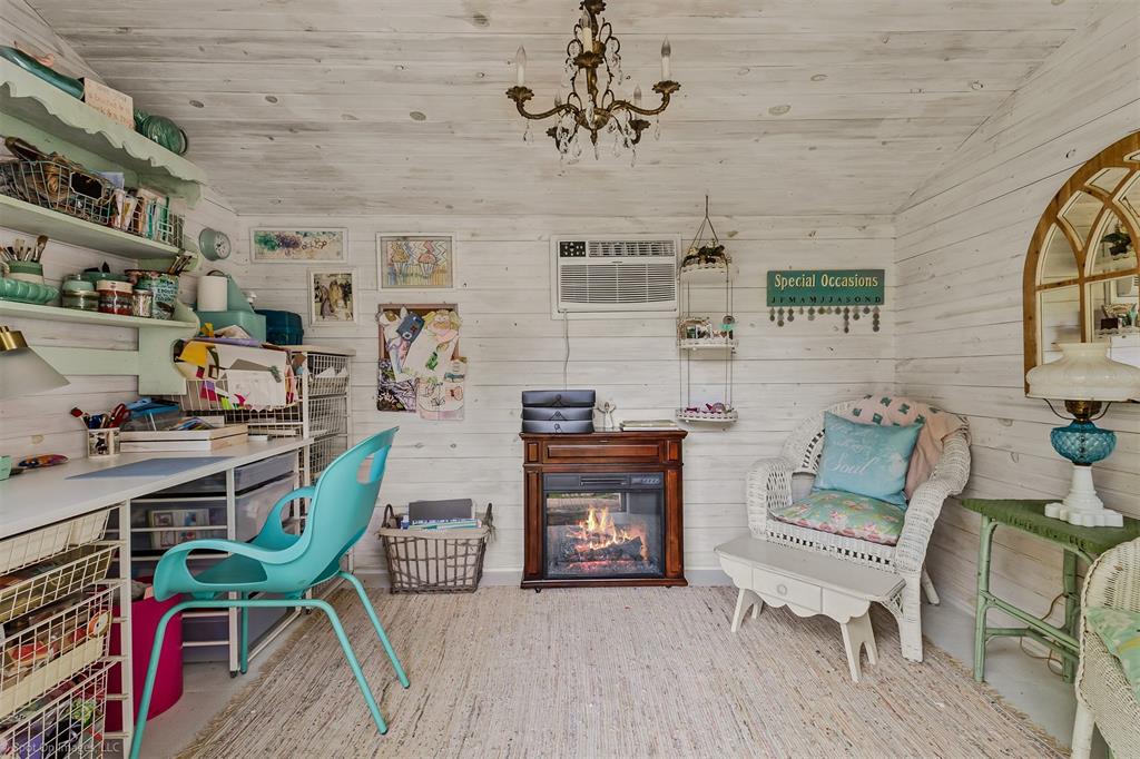 1790 Wind Hill Road Rockwall, TX 75087 - Photo 29 of 29 a living room with furniture and a wooden floor