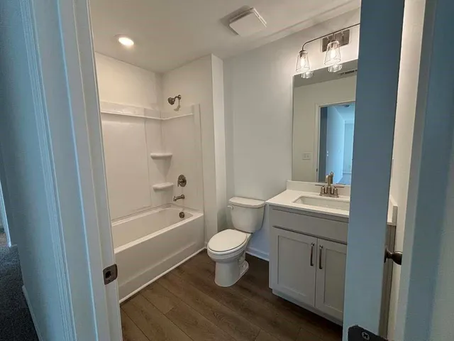 a view of yard with mountain and trees