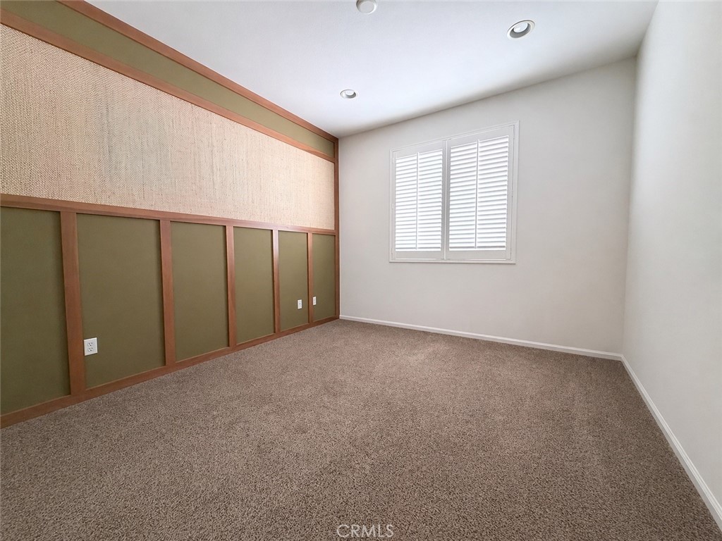 562 Quigley Lane Perris, CA 92570 - Photo 14 of 29 a view of an empty room with a window