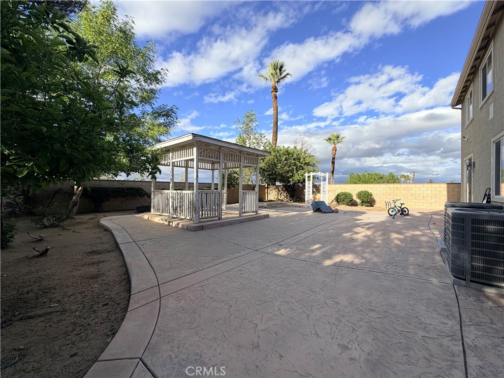 562 Quigley Lane Perris, CA 92570 - Photo 29 of 29 a view of a street with a building in the background