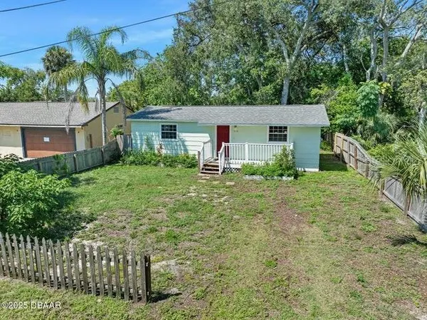 a house view with a garden space
