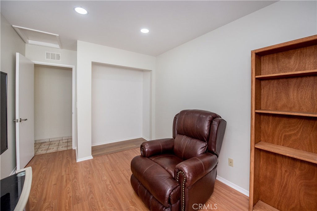 4459 Pine Street Pico Rivera, CA 90660 - Photo 21 of 38 a living room with furniture and wooden floor