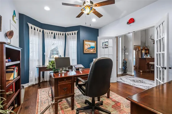 a work room with furniture and a workspace