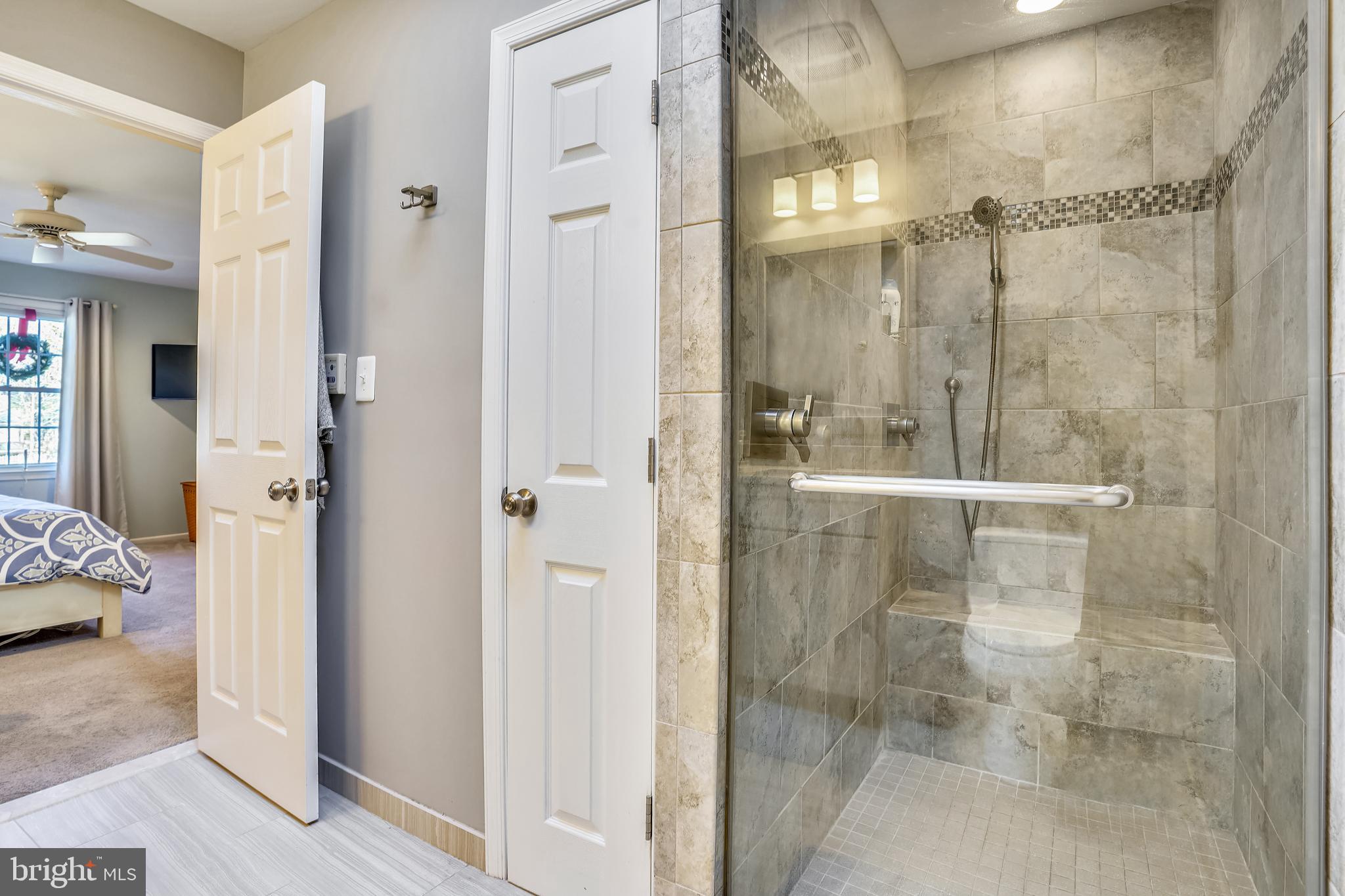 10062 Marshall Pond Road Burke, VA 22015 - Photo 33 of 74 Primary Bathroom Shower and closet
