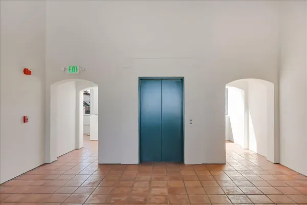 a view of a hallway with closet