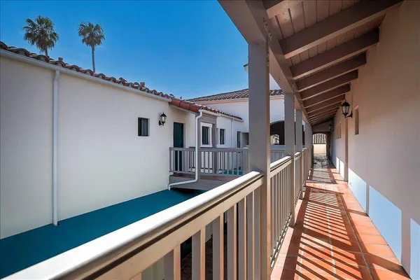 a view of a house with pool and porch