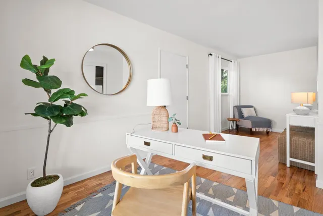 a bed room with a bed and a window