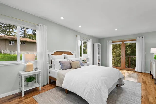a spacious bathroom with a double vanity sink mirror and
