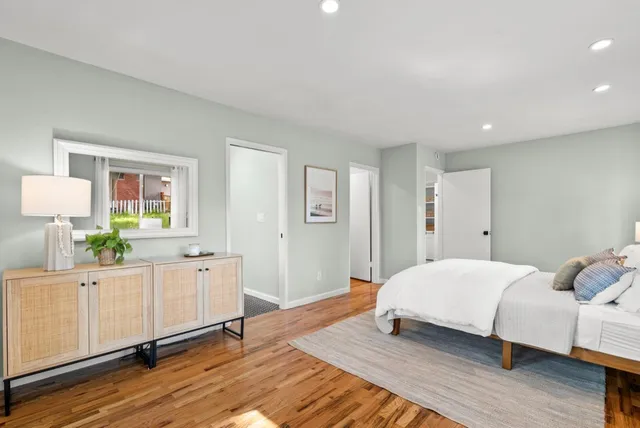 a view of balcony with wooden floor