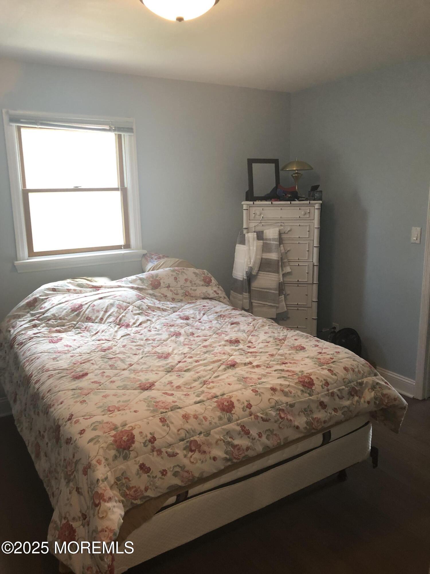 12 York Avenue Spring Lake, NJ 07762 - Photo 11 of 15 a bedroom with a bed and a window