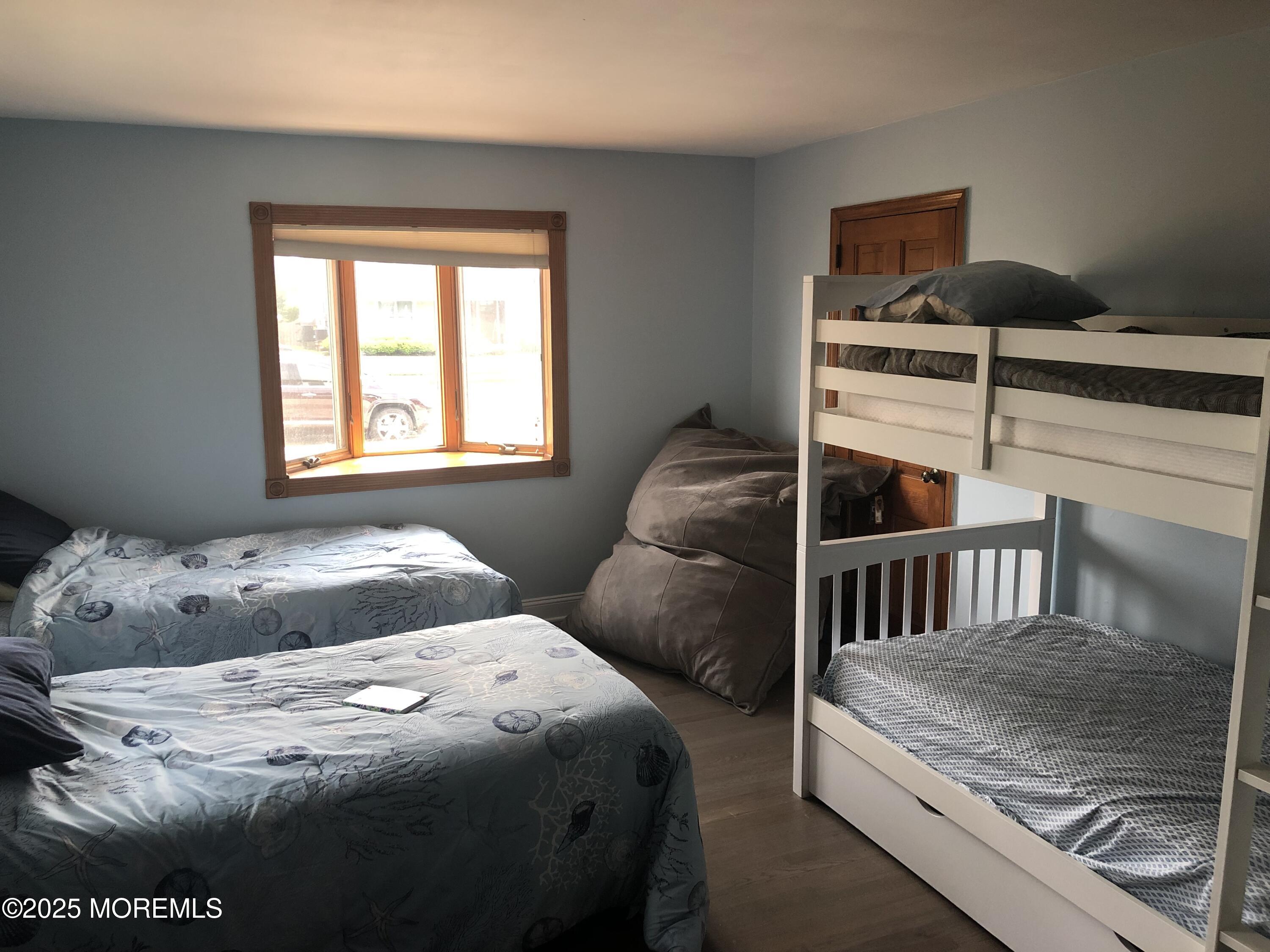 12 York Avenue Spring Lake, NJ 07762 - Photo 12 of 15 a bedroom with a bed and window