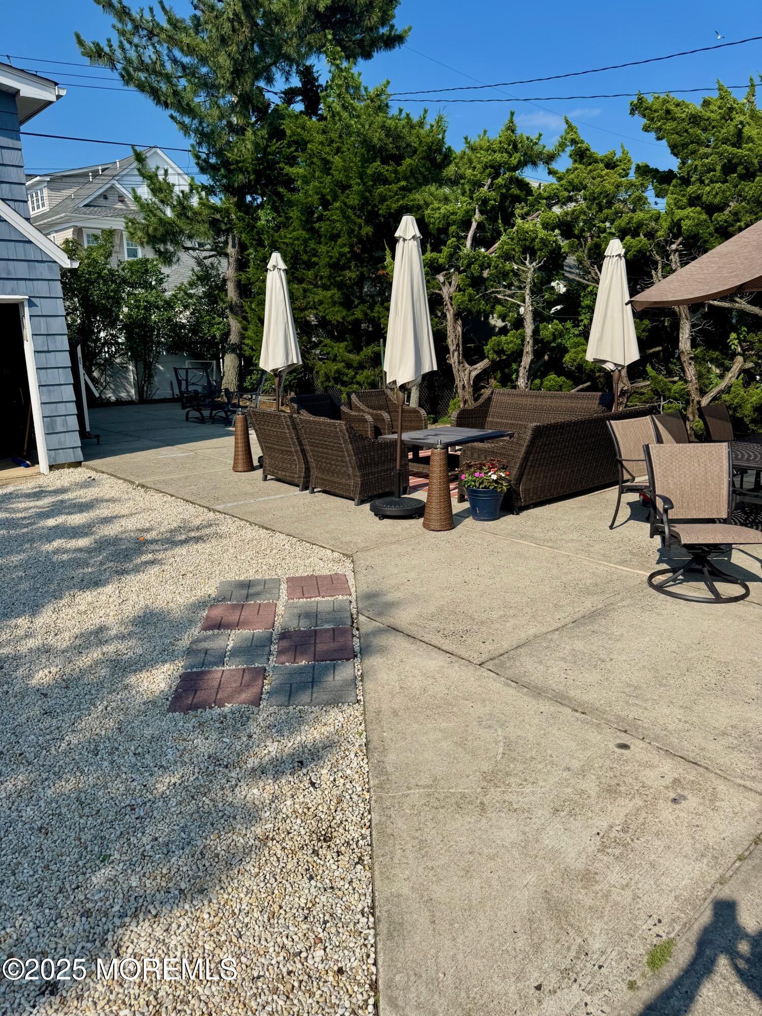 12 York Avenue Spring Lake, NJ 07762 - Photo 15 of 15 a view of a backyard with chairs