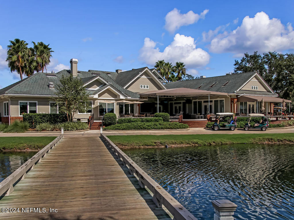 2771 Shade Tree Drive Fleming Island, FL 32003 - Photo 28 of 40 a front view of a house with garden