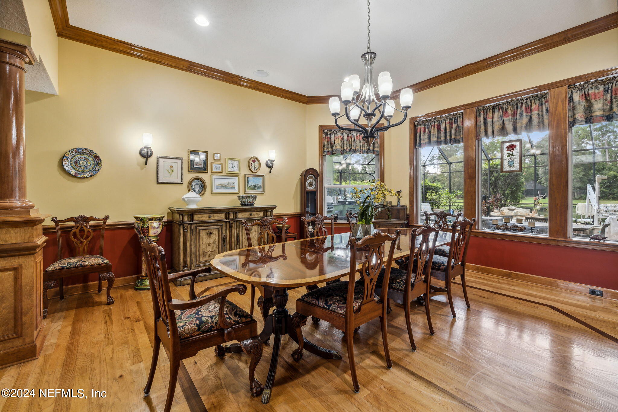 2771 Shade Tree Drive Fleming Island, FL 32003 - Photo 3 of 40 a view of a dining room with furniture window and wooden floor