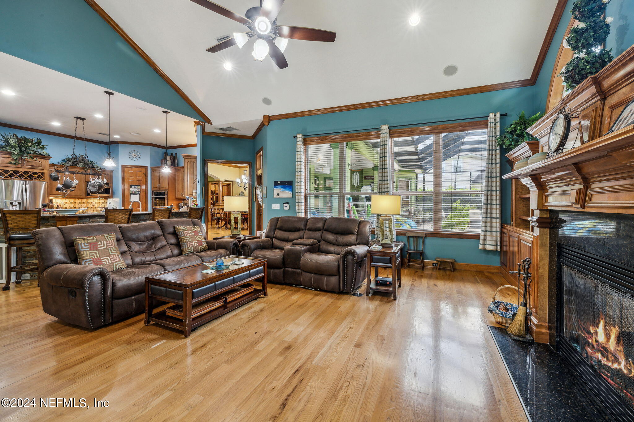 2771 Shade Tree Drive Fleming Island, FL 32003 - Photo 6 of 40 a living room with furniture and a fireplace