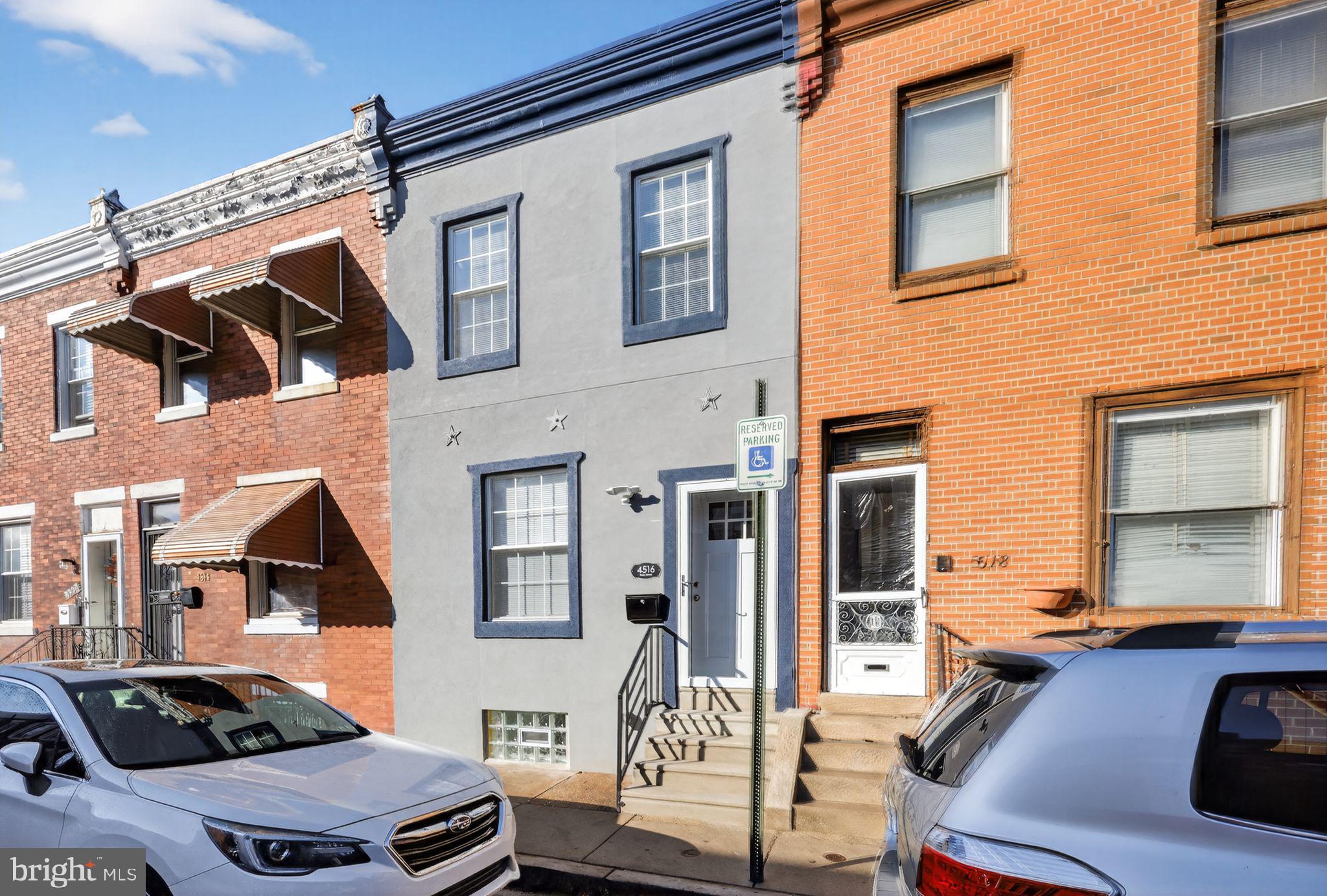 4516 North Mole Street Philadelphia, PA 19140 - Photo 1 of 30 a front view of a house with many windows