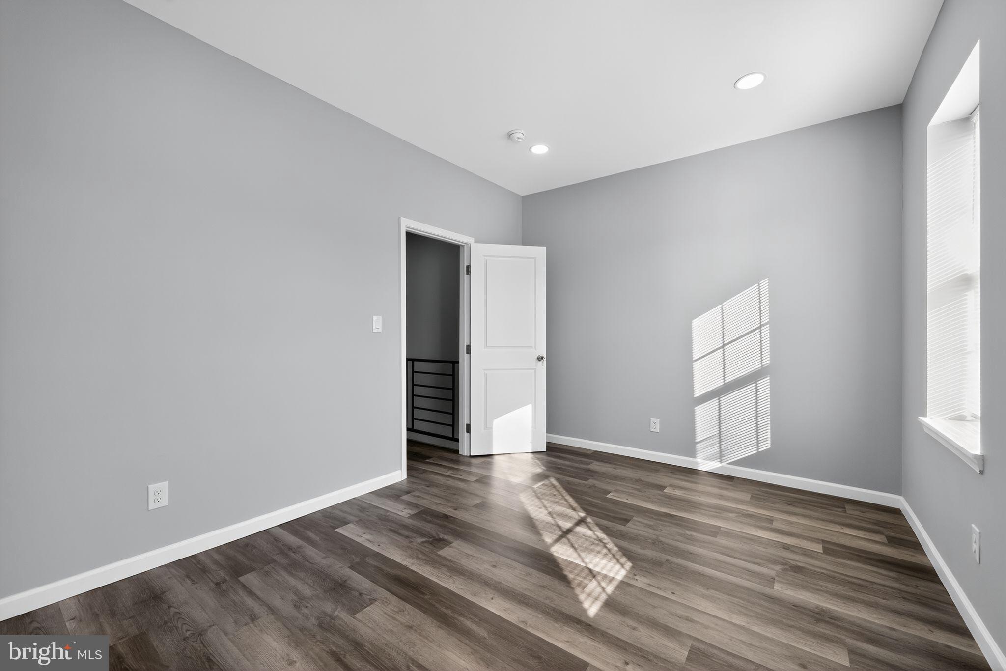 4516 North Mole Street Philadelphia, PA 19140 - Photo 19 of 30 wooden floor in an empty room with a window