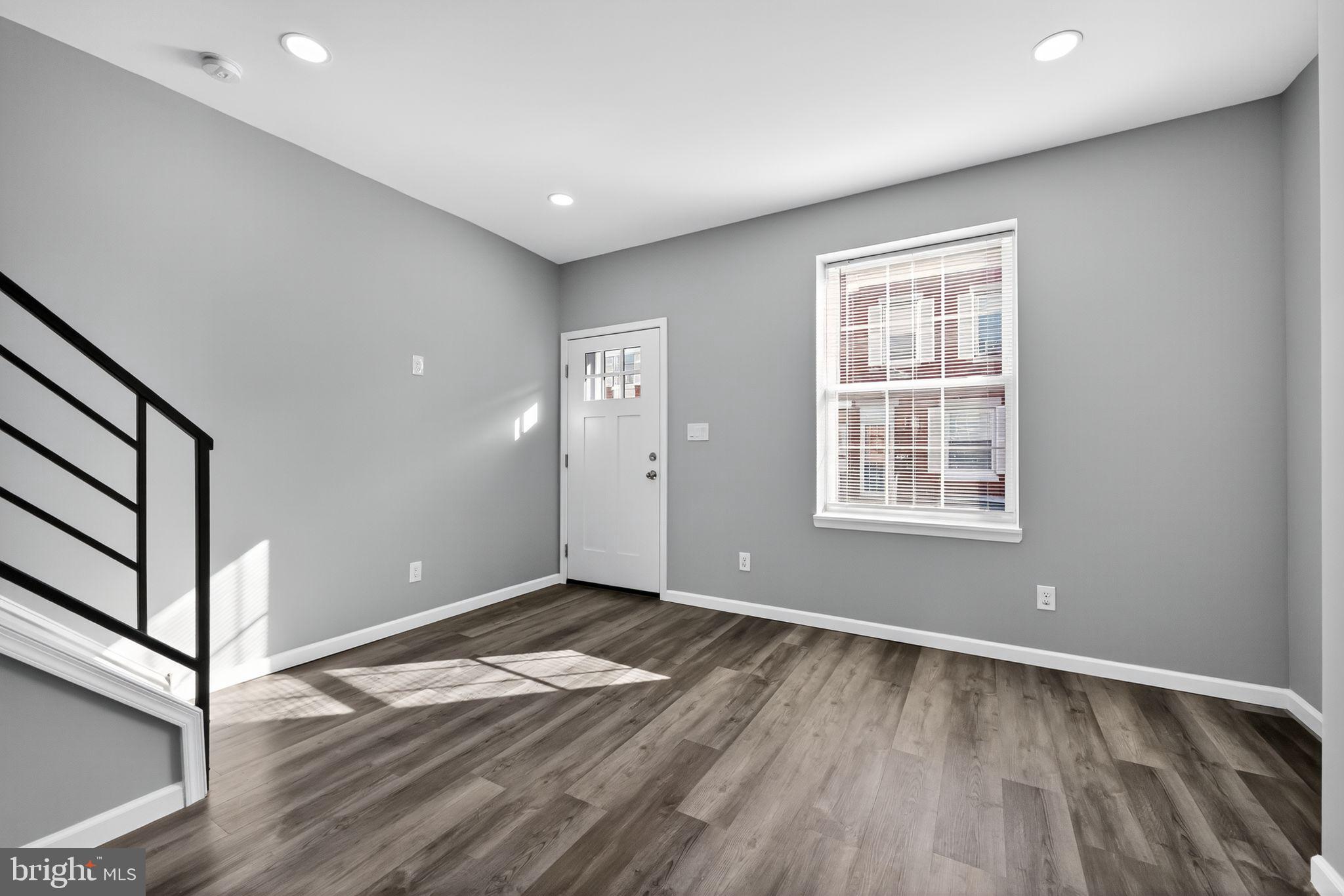 4516 North Mole Street Philadelphia, PA 19140 - Photo 6 of 30 wooden floor in an empty room with a window