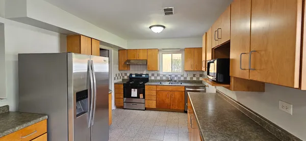 $379,900 | 9449 Dee Road, Des Plaines, IL 60016